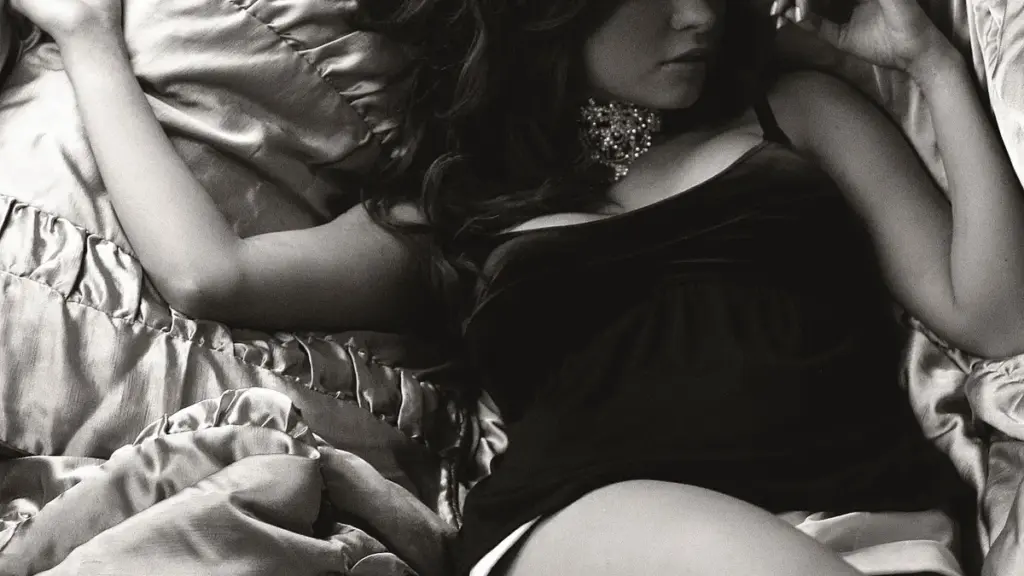 Photograph of a woman asleep in bed