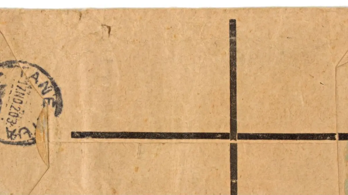 A historic addressed envelope with postage stamps