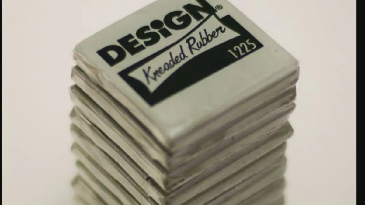 A white eraser on a pale background