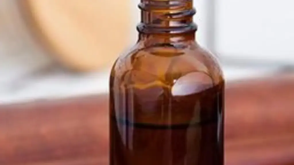 An amber glass bottle with a dropper